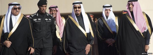 King Salman and officials in file photo dated January 2015