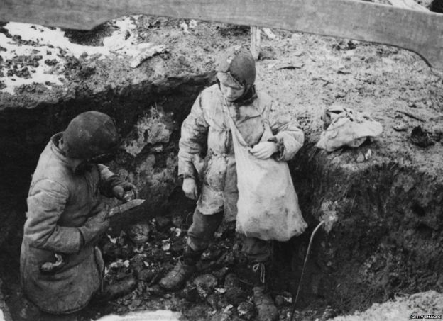 Two boys with a cache of potatoes they have found during the man-made Holodomor famine in the Ukraine, former Soviet Union, Spring 1934