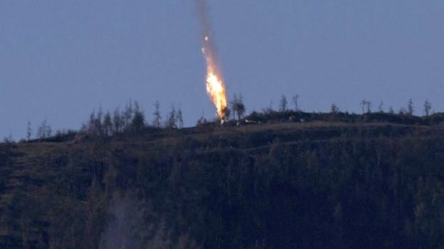 A still from video footage shown by the HaberTurk TV Channel shows a plane coming down near the Turkish-Syrian border on 24 November 2015