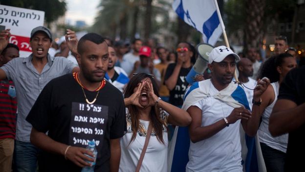 Israelis of Ethiopian descent and their supporters protest against alleged police racism and brutality on 22 June 2015 in Tel Aviv, Israel