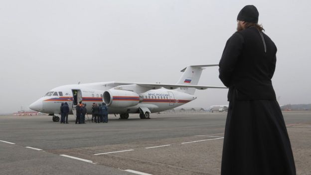 A Russian Orthodox priest at Pulkovo airport in St Petersburg where more bodies of victims of the Russian passenger plane crash are arriving, 6 November 2015.