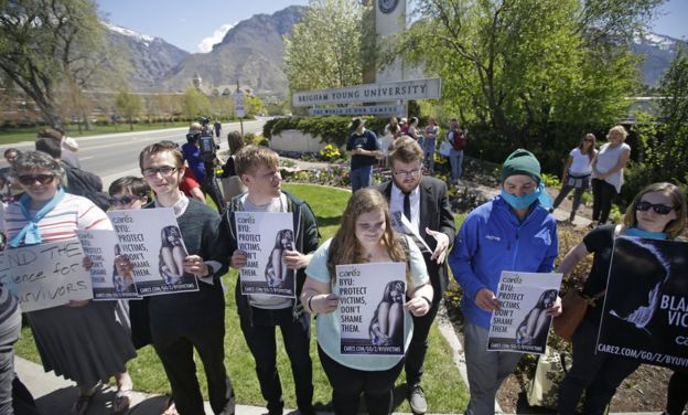 Protesters stand in solidarity with rape victims on the campus of Brigham Young University during a sexual assault awareness demonstration Wednesday, 20 April 2016, in Provo, Utah