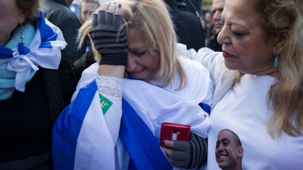 A supporter of Elor Azaria cries outside the military court in Tel Aviv, Israel (4 January 2017)