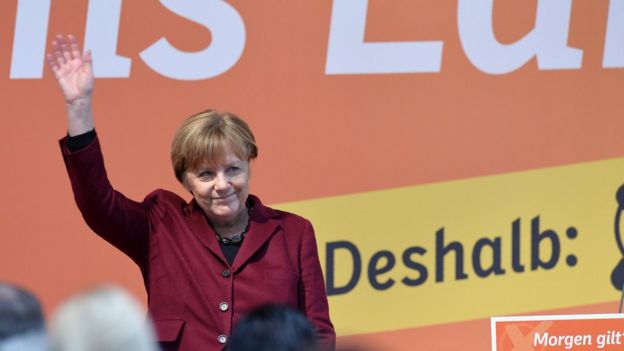 German chancellor Angela Merkel waves after delivering a speech at the last electoral meeting on March 12, 2016 in Haigerloch, southwestern Germany