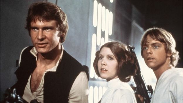 Harrison Ford, Carrie Fisher e Mark Hamill no primeiro 'Guerra nas Estrelas', em 1977