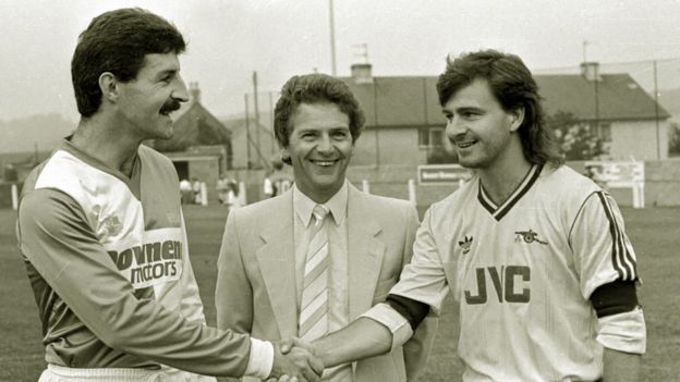 Geoff Twentyman of Bristol Rovers shakes hands with Arsenal's Charlie Nicholas