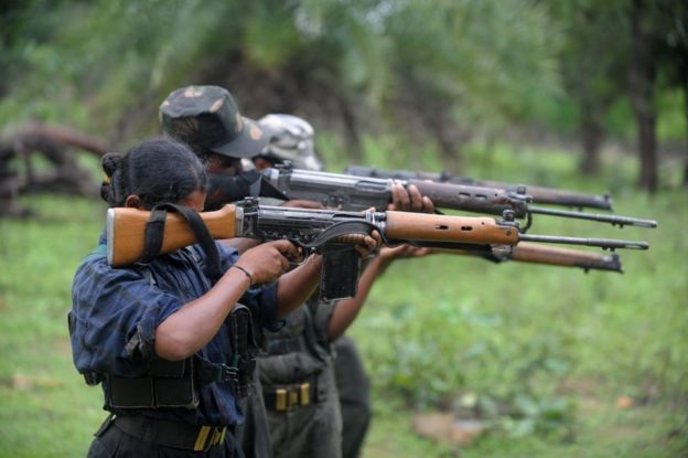 Indian Maoists ready their weapons as they take part in a training camp in a forested area of Bijapur District in the central Indian state of Chhattisgarh on July 8, 2012