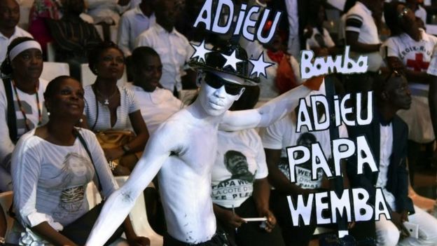 Fans of the late Papa Wemba, attend a concert in tribute to him on April 27, 2016 at the Palace of Culture in Abidjan