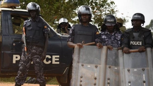 Ugandan police at the home of opposition election candidate Kizza Besigye