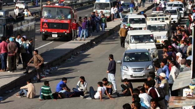 People block Chandigarh Shimla highway in Panchkula in Haryana state, India, Sunday Feb. 21, 2016