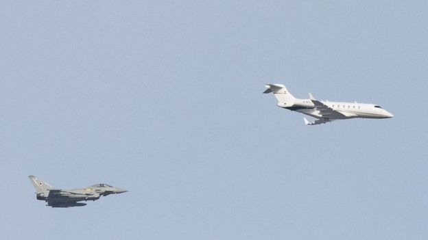 A Typhoon jet escorting the plane