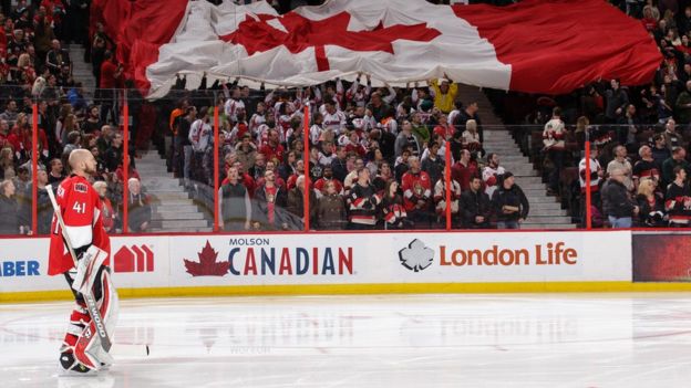 Craig Anderson #41 of the Ottawa Senators looks on during the singing of the national anthems prior to an game against the St. Louis Blues at Canadian Tire Centre on March 1, 2016
