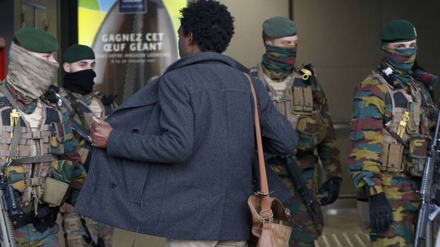 Man searched by soldiers at entrance to Brussels metro station - 25 March