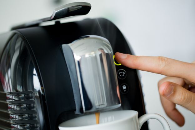 coffee being prepared with the new Coffee Capsule System 'Expressi' of the discount supermarket chain Aldi