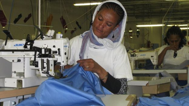 Lady working at the Dolce Vita garment factory