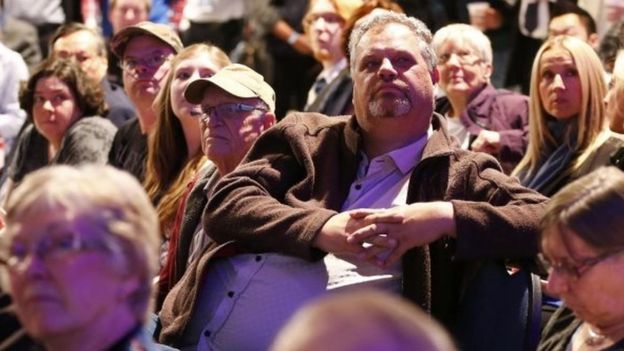 Conservative Party supporters watch election results in Calgary