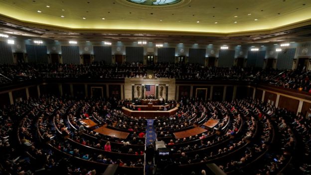 U.S. President Barack Obama (at podium) delivers his State of the Union address to a joint session of Congress