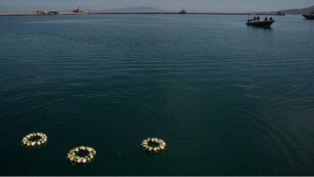 Wreathes thrown by Pope Francis into the sea