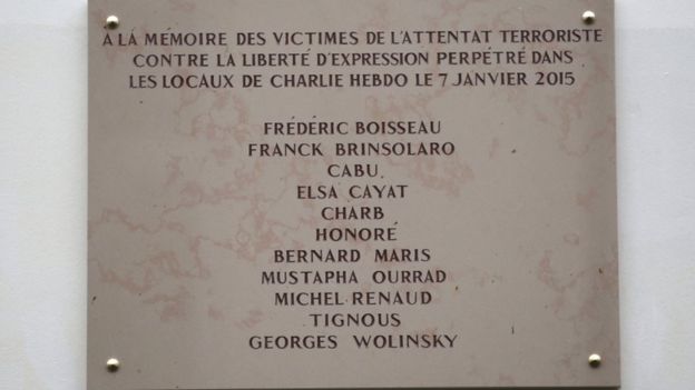 The plaque unveiled outside Charlie Hebdo's offices