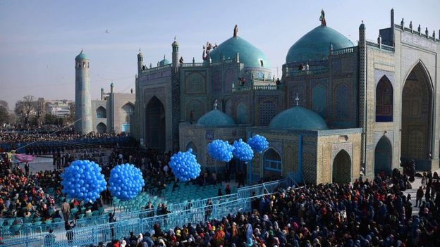 Afghan revellers gather in front of the Hazrat-e-Ali shrine for Nowruz festivities which marks the Afghan new year in Mazari-i-Sharif on March 21, 2015.