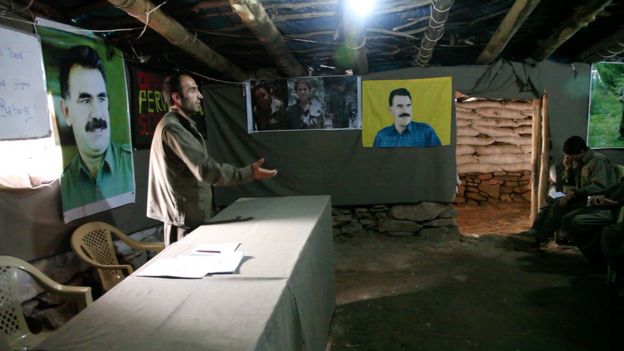 An instructor talks about the PKK to recruits at a training camp in northern Iraq