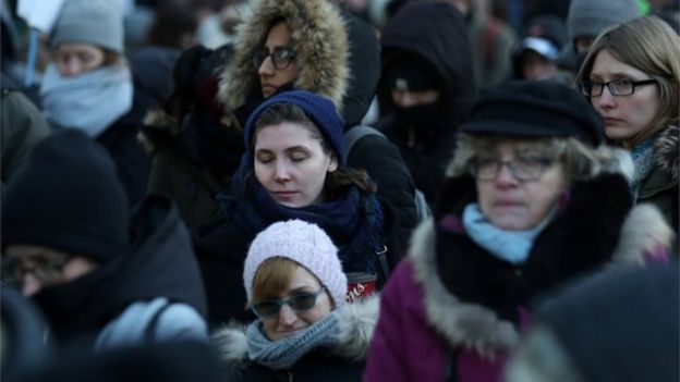 Canadians pause for a moment of silence for the victims of the mosque shooting in Quebec.