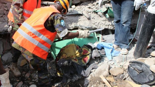 Rescuers trying to dig the woman out