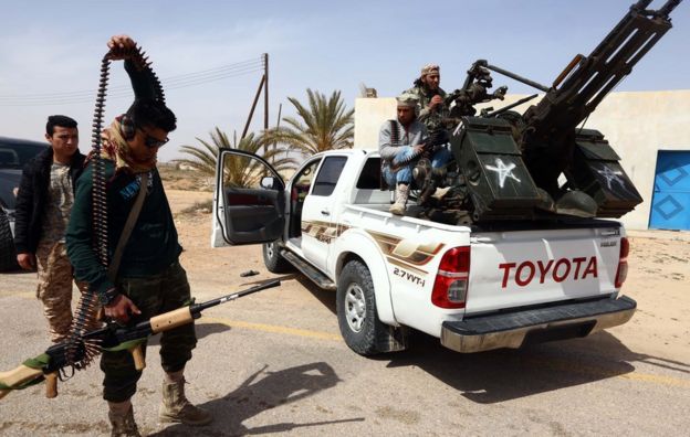 Members of forces loyal to Libya's Islamist-backed parliament General National Congress (GNC) prepare to launch attacks as they continue to fight Islamic State (IS) group jihadists on the outskirts of Libya's western city of Sirte on March 16, 2015