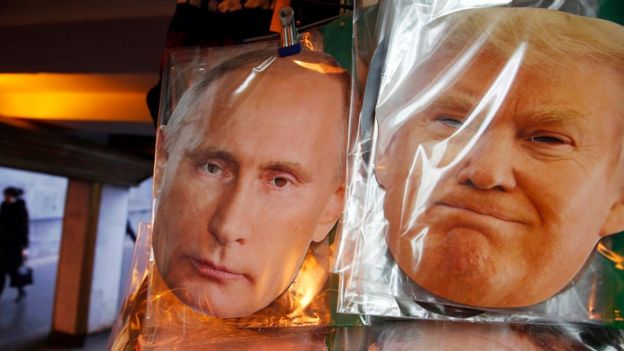 Afiche con los rostros de Putin y Trump