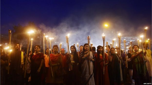 Bangladeshi secular activists taking part in a torch-lit protest against the killing of Avijit Roy, a US blogger of Bangladeshi origin