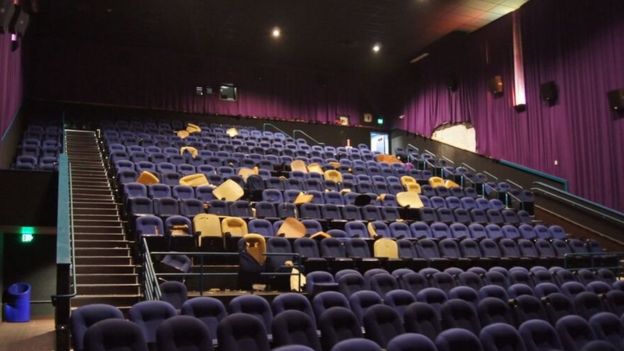 The Colorado cinema with bullet holes following the attack by James Holmes