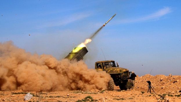 Syrian army fires a rocket at Islamic State group positions in the province of Raqqa, Syria (17 February 2016)