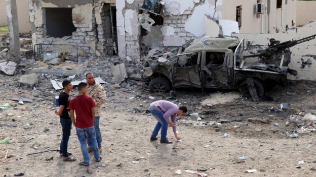 Damage at the scene of an explosion at the Mislattah checkpoint near Khoms, on the coast road between Tripoli and Misrata in Libya on 24 November, 2015