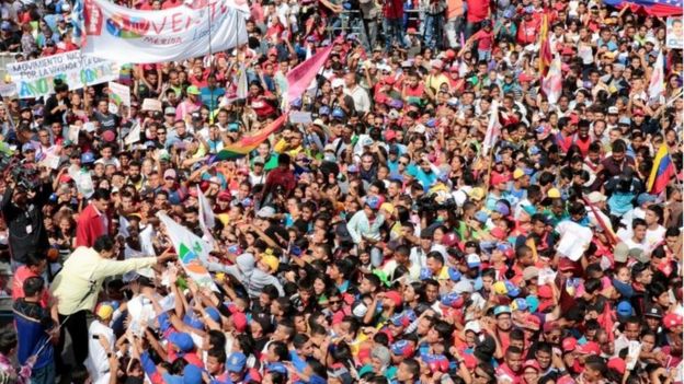 Venezuela's President Nicolas Maduro (L) greets supporters during a rally in Caracas, Venezuela June 1, 2016.