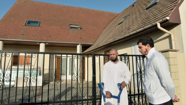 Abdallah Benali (L), president of the association Generation 2000 Mosque of Luce, and Vice President Karim Benaya, talk in front of the Mosque of Luce, on 15 November 2015.