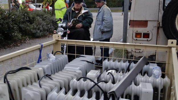 Portable heaters are brought to a region of Italy after an earthquake