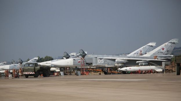 Russian Sukhoi SU-24 bombers standing on an airfield at the Hmeimim airbase in the Syrian province of Latakia