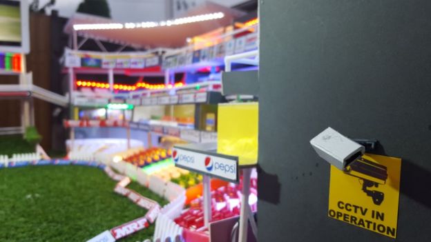 Stadium close up, showing CCTV camera and seating
