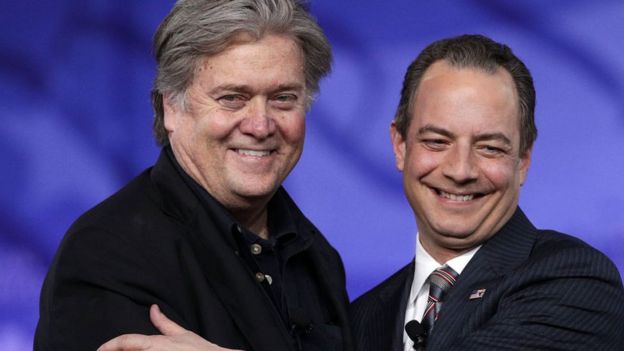 Steve Bannon and Reince Priebus embrace at a political conference in Washington.