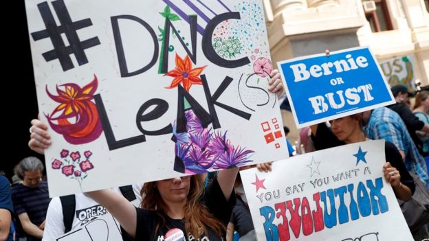 Demonstrators make their way around downtown, Monday, July 25, 2016, in Philadelphia, during the first day of the Democratic National Convention