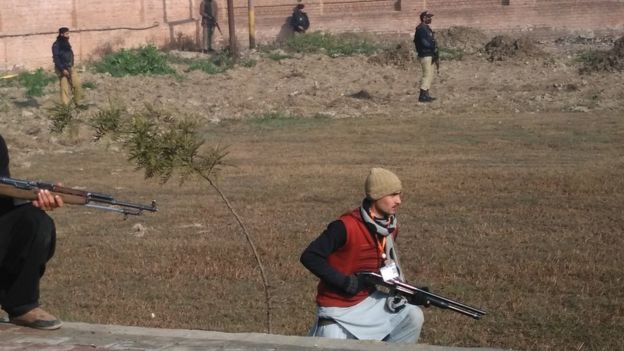 Security forces outside the university in Charsadda, Pakistan, 20 January