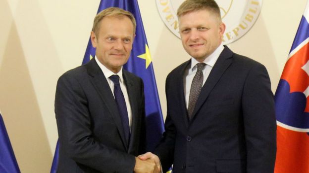 Slovak Prime Minister Robert Fico, right, welcomes European Council President Donald Tusk, left, for talks at the Presidential Palace prior to an EU summit in Bratislava on Thursday, 15 September 2016.
