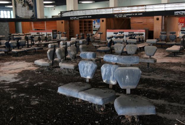 Bird droppings cover seats in a waiting room inside the old Nicosia airport terminal building, now located within the UN-controlled buffer zone that separates the Turkish-occupied north from the south of Cyprus, on September 14, 2010.