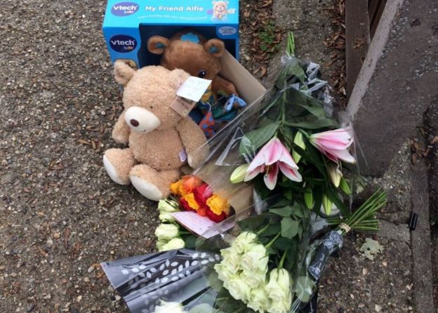 Tributes outside the house where dog attack took place