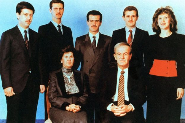 Syrian President Hafez al-Assad and his wife Anisa posing for a family picture with his children (L to R) Maher, Bashar, Bassel, who died in a car accident in 1994, Majd and Bushra.