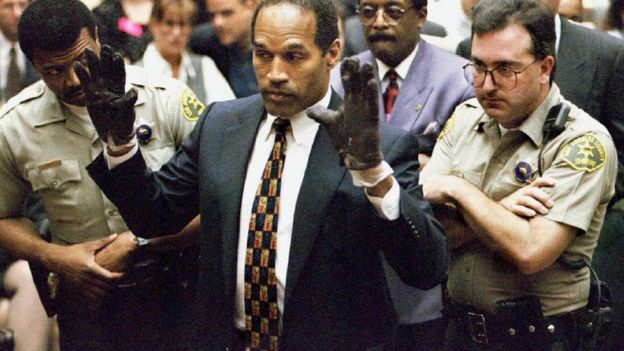 OJ Simpson shows the jury leather gloves in 1995