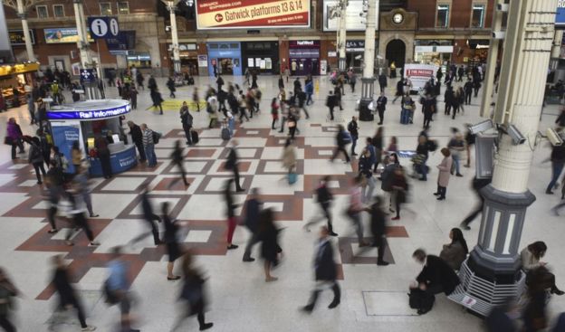 People in a train station