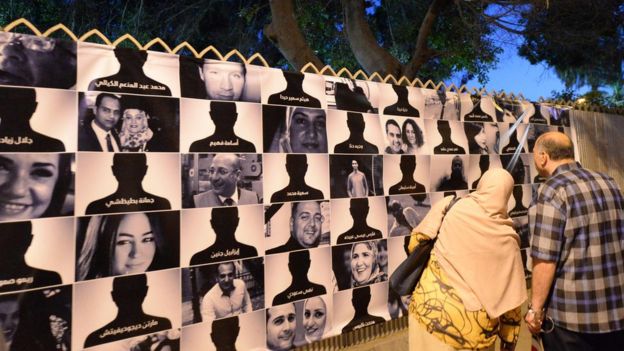 A memorial wall to the 66 victims of the EgyptAir crash