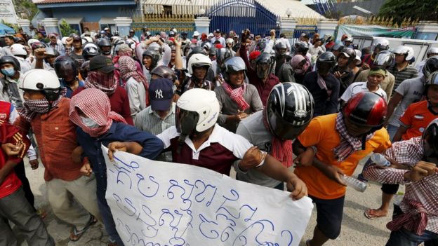 Protesters gather in front of the house of Kem Sokha, vice president of the Cambodia National Rescue Party (CNRP) and deputy house president, during a demonstration to demand his resignation in Phnom Penh October 26, 2015.