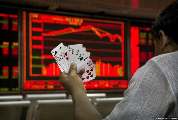 Chinese day trader plays cards